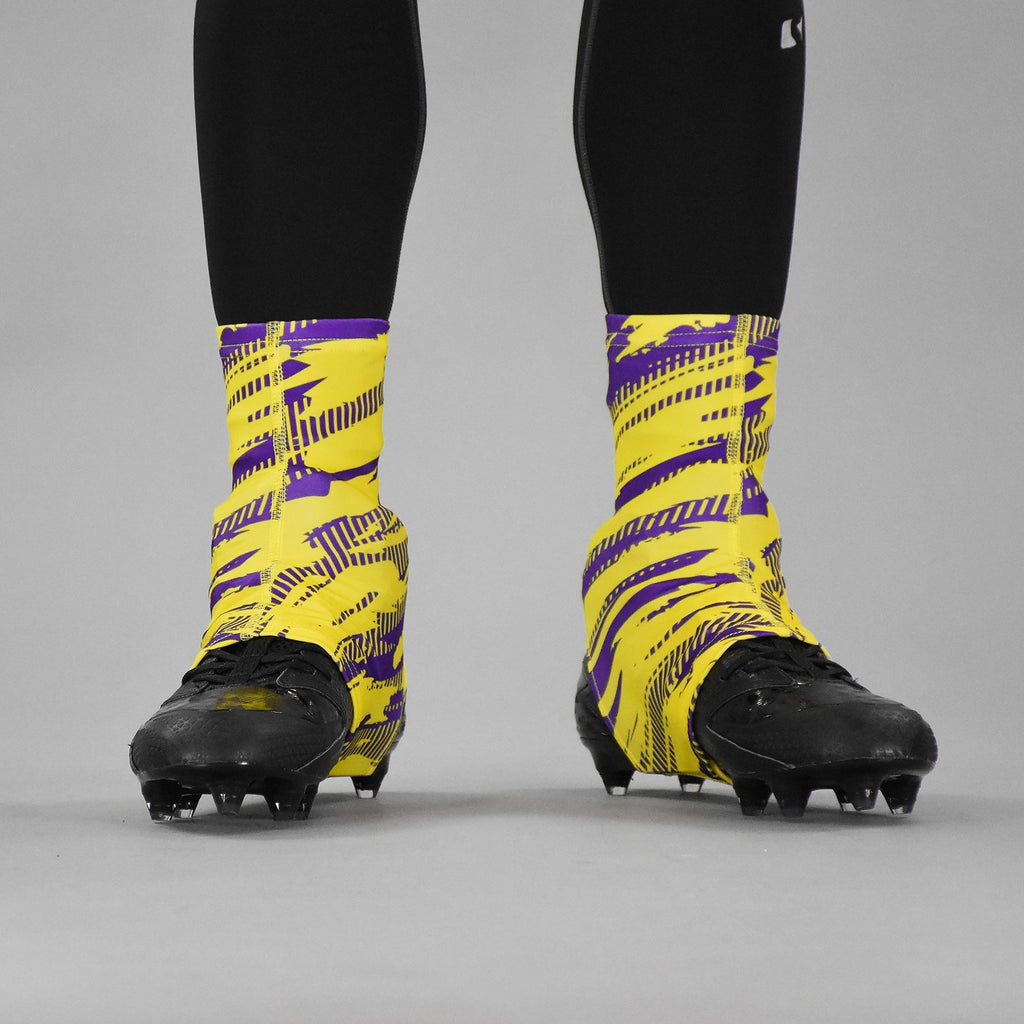 Purple and yellow cleats shop